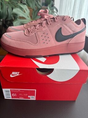 Nike Low-Top Sneakers in Dusty Rose with Black Swoosh